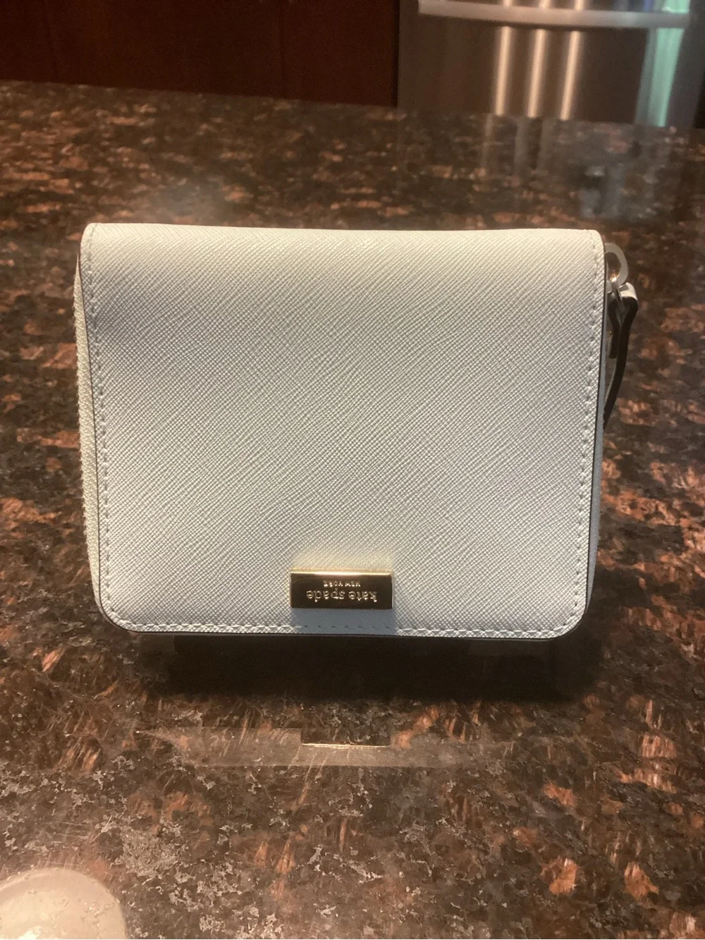 kate spade pale blue small flap wallet with gold plaque